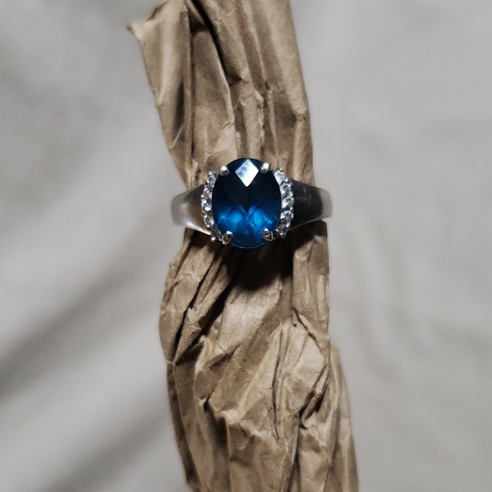 .925 Silver Ring with Blue Topaz and Crystals